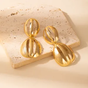 Gold hollow geometric earrings for women, retro metal statement ear studs for daily wear.