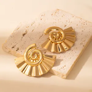 Vintage gold-plated fan spiral metallic stud earrings, statement geometric jewelry style.