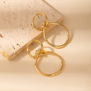 Gold-plated geometric interlocking circle knot stud earrings for women vintage style.