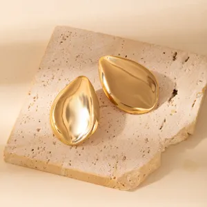 Gold geometric leaf earrings for women, minimalist retro metal drop earrings for daily wear.