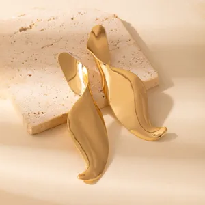 Gold statement metal leaf earrings, minimalist vintage geometric fashion jewelry for women.