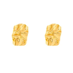Gold irregular geometric leaf earrings detail shot, vintage metal aesthetic jewelry design.