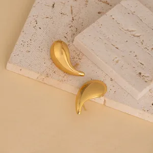 Gold teardrop metal stud earrings, minimalist geometric style, elegant fashion jewelry accessory.