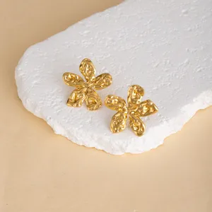 Retro gold flower metal earrings, unique design geometric stud earrings for women and daily wear.