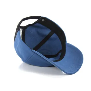 Blue mesh baseball cap inner view, casual summer hat detail, breathable fabric construction.