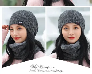 Detail view of the winter fleece-lined knitted hat and cozy scarf set in dark grey.