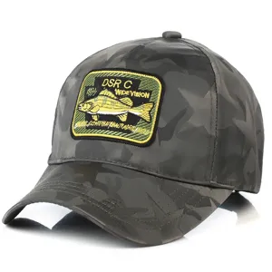 Camo baseball cap detail showing embroidered fish patch, tactical style adjustable hat.