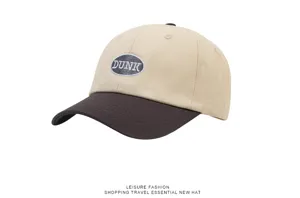 Two-tone baseball cap with contrast brim and DUNK embroidery patch for outdoor casual wear.