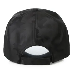 Close-up of black baseball cap with dark pattern, adjustable strap detail for casual wear.