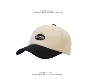 Contrast baseball cap with DUNK embroidery, casual two-tone sun protection hat for outdoor use.