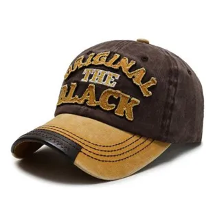Vintage washed baseball cap with embroidered letters, retro two-tone design, casual unisex hat.