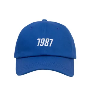 Blue embroidered baseball cap for men and women, featuring 1987 casual soft top streetwear hat.