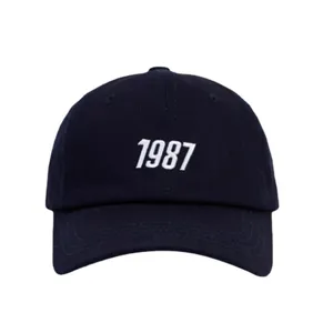 Navy blue baseball cap for women and men featuring a stylish white 1987 embroidery design.
