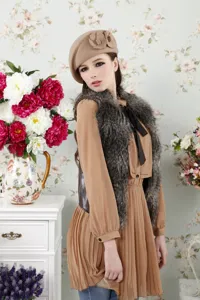 Stylish women wool felt beret with elegant floral decoration for autumn and winter wear.