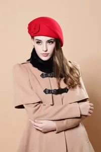 Elegant red wool beret hat for women with floral detail, perfect warm winter fashion accessory.