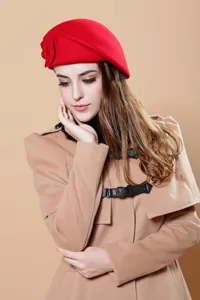 Elegant red wool beret for women with stylish flower detail, warm autumn winter fashion accessory