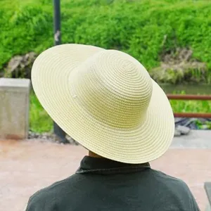 Outdoor sun protection straw hat, wide brim tea picking and farm work cap for summer wear.
