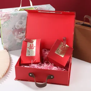 Red flip-top wedding gift box with handle, festive large packaging for holiday presents.