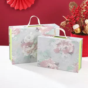 Floral print gift box with handle detailed view, perfect for wedding and festive party packaging.