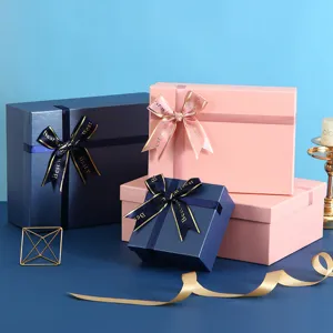 Detail view of elegant gift boxes with ribbons, perfect for festive occasions and celebrations.