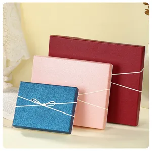 Decorative gift boxes with ribbon bows set, thick corrugated paper packaging boxes for jewelry.
