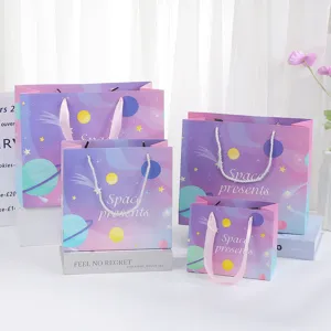Space themed gift paper bags purple pink cute cosmetic packaging tote bags for holidays.