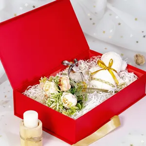Red gift box set with artificial flowers and bear towel, perfect for Valentine's Day.