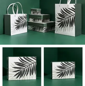 Rectangular green leaf gift box set with paper bags, elegant packaging for perfume and gifts.