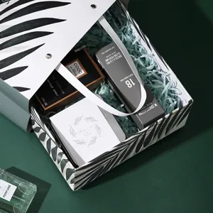Large rectangular gift box with green leaf pattern and heaven-and-earth cover design.