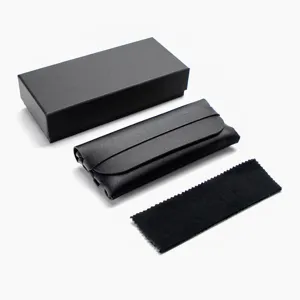 Detailed view of black leather glasses pouch set with hard box and soft cleaning cloth.