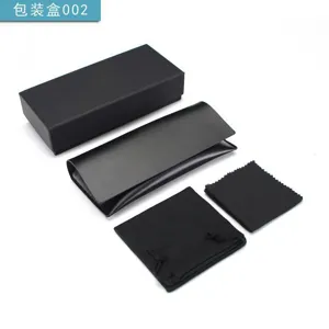 Black leather sunglasses storage box set with protective case and cleaning cloth accessories.