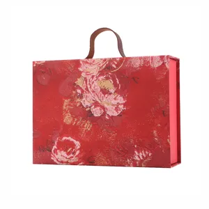 Red festive gift box with handle, large flip-top packaging for wedding and New Year celebrations.