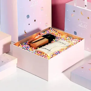 Gradient pink purple star moon gift boxes set with colorful foam balls for birthday parties.