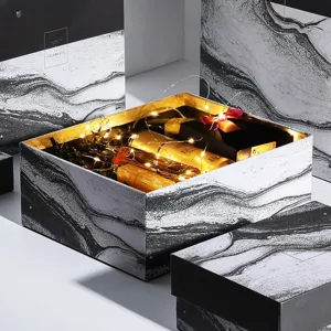 Black and white marble pattern paper gift box set with elegant design for presents packaging.