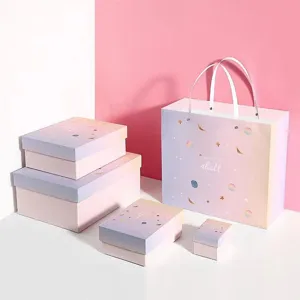 Gradient pink gift box set with matching tote bag, stylish starry sky packaging for birthday.