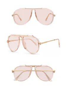 Stylish oversized aviator sunglasses with pink transparent frame and gold metal temples.