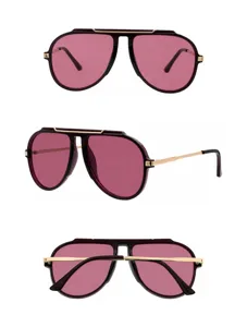 Detailed view of stylish pilot sunglasses with pink lenses and gold accents for men and women.