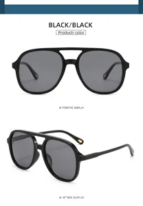 Detail view of black double-bridge pilot polarized sunglasses with temple cutouts.