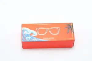 Detailed view of the orange packaging box featuring a stylish tropical sunglasses graphic.