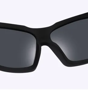 Close-up view of polarized cycling sunglasses with matte black frame for outdoor use.