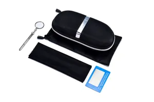 Black glasses case set with storage pouch, cleaning cloth, screwdriver and test card.