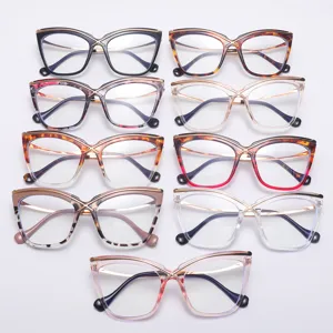 Fashion cat eye blue light blocking glasses with metal cross frame, trendy oversized eyewear.