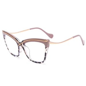 Fashion cat-eye anti-blue light glasses with metal cross design and trendy tortoise frame.