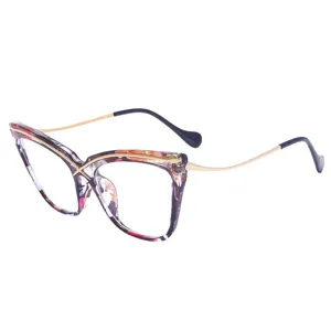 Fashion cat eye blue light blocking glasses with chic metal cross frame for women daily.