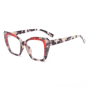 Trendy tortoise shell and red color block large frame anti-blue light glasses for women daily wear.