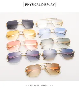 Detailed view of fashionable rimless gradient sunglasses with stylish metal frames and lenses.