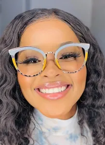 Close-up detail shot of stylish cat-eye anti-blue light glasses with gradient frame.