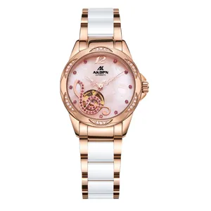 Superbe montre mécanique automatique pour femme avec bracelet en céramique et cadran rose.