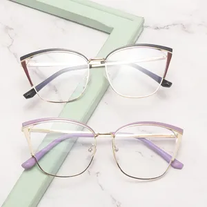 Trendy metal cat-eye eyeglass frames for women, two-tone anti-blue light optical glasses.