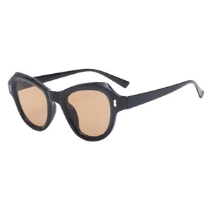 Women fashion cat-eye sunglasses with irregular black frame and brown UV protection lenses